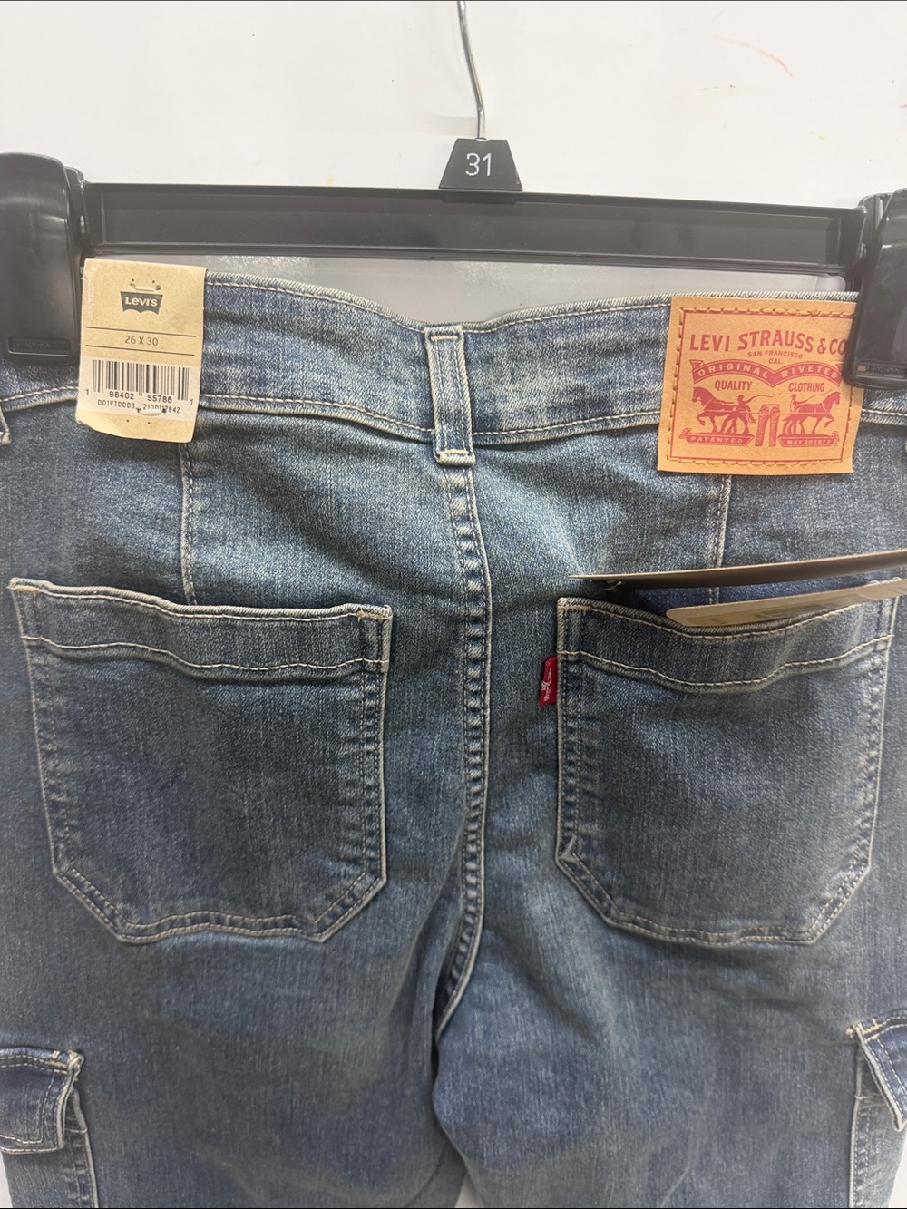Levi's Medium Blue Denim High Rise Jeans with Back Pockets